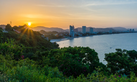 Sunset behind mountain at Hua Hin. Scenery view from Khao Takiap viewpoint, Prachuap Khiri Khan, Thailand.の写真素材