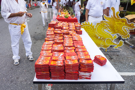 TAKUA PA, PHANG NGA/THAILAND - OCT 14, 2018: Chinese firecracker rolls in a vegetarian festival. This annual festival takes place from Oct 9 to Oct 17, 2018.のeditorial素材
