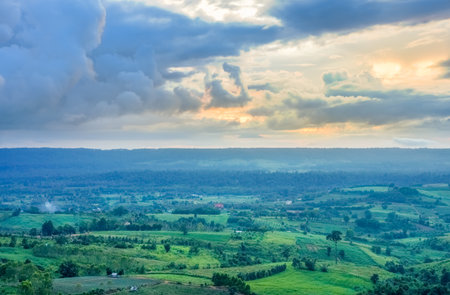Thai rural area in cloudy day view from Khao Ta-Khian Ngo Viewpoint. Location in Khao Kho District, Phetchabun, Thailand, Southeast Asia.の写真素材