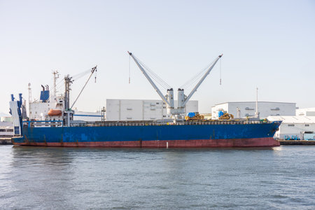 Break bulk or general cargo ship with cranes at port. This area is located at Osaka bay in Japan.の写真素材