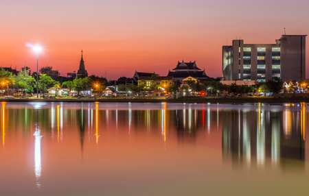 Cityscape of Udon Thani view from Nong Prachak Public Park at twilight time. The province in northeast Thailand, Southeast Asia.の写真素材
