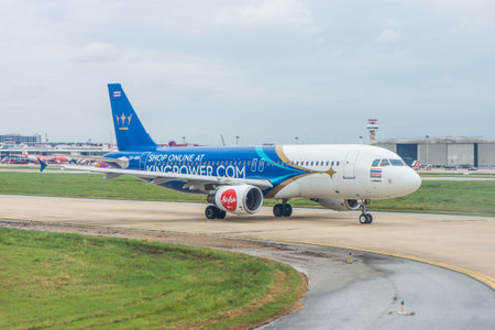 BANGKOK - NOV 21, 2017: Airbus A320 of Thai AirAsia on taxiway in Don Mueang International Airport. The airplane has King Power, shareholder, advertising on the body.のeditorial素材