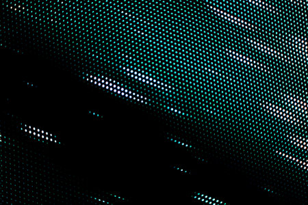 Random of green blue and white light dots on black. For using as pattern and background.の写真素材