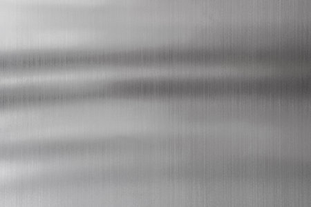Shadows on flat iron. Metal surface for background and texture.の写真素材