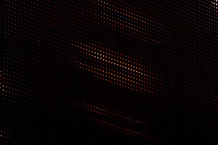 Small light dots on black. For using as pattern and background.の写真素材