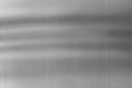 Shadows on flat steel. Metal surface for background and texture.の写真素材