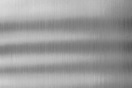 Shadows on flat aluminium. Metal surface for background and texture.の写真素材