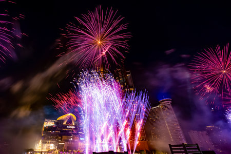 BANGKOK - DEC 31, 2020: The eco-friendly fireworks over Chao Phraya River in front of ICONSIAM. The new-normal celebration of The New Year 2021 countdown in Thailand.のeditorial素材