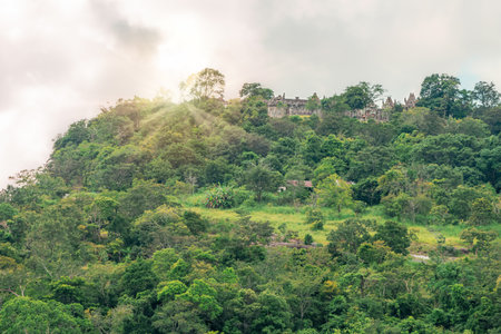 Forest at Phanom Dong Rak mountain range view from Pha Mo I Daeng viewpoint in Khao Phra Wihan National Park, Kantharalak, Si Sa Ket, Thailand. There are house and old Preah Vihear temple on the top.の写真素材