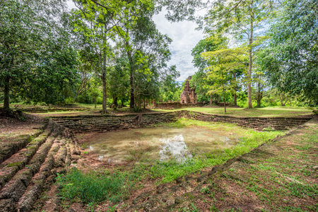 Prasat Ta Muean Tot view from the pond. It is The Arokayasala or Hospital with Ancient Khmer Art of Bayon Style.の写真素材