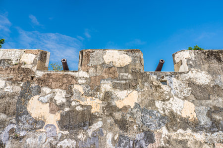 Two cannons on Mount Fortress in Macau, China. The fort also called Fortaleza do Monte or Monte Forte.の写真素材