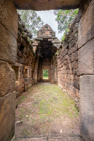 Front entrance of Prasat Ta Muean. It is The Chapel for the rest house with Ancient Khmer Art of Bayon Style.の写真素材