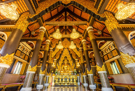 LAMPANG, THAILAND - APR 1, 2021: Lanna style of Buddha image hall or Wihan Somdet Ong Pathom at Wat Phra That Doi Phra Chan. The Thai Buddhist temple on the top hill of Doi Phra Chan mountain in Mae Tha.のeditorial素材