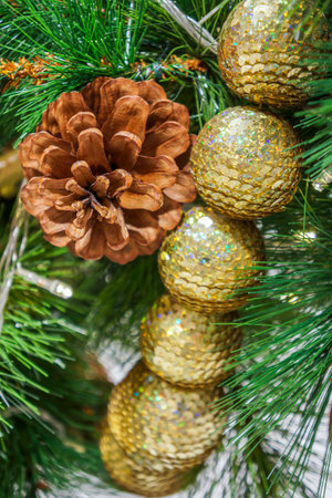 Christmas ornaments decorated on tree. Xmas decoration are used to festoon artificial tree.の写真素材