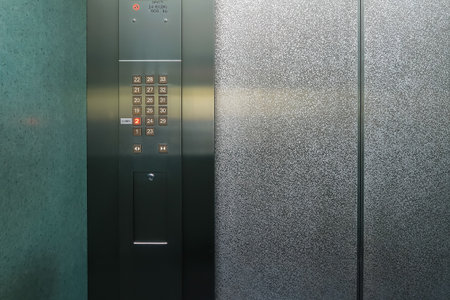 Control panel in modern passenger elevator. It consists of choose-floor and open/close-door buttons.の写真素材