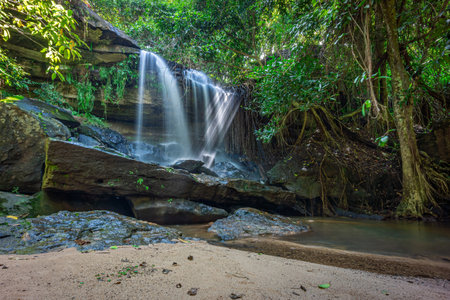Samrongkiat Waterfall Arboretum in dry evergreen forest. It is medium sized waterfall in Khun Han, Si Sa Ket, Thailand.の写真素材