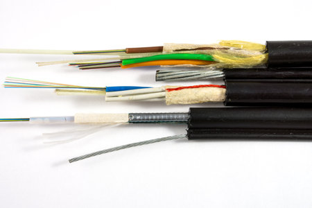Structure of Figure (8) and ADSS Optical Fiber Cables isolated on white background. They consist of messenger wire OFC cables with and without steel armor.の写真素材