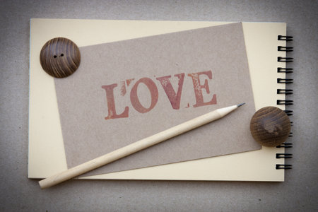 Notebook and pencil  with love cardの写真素材