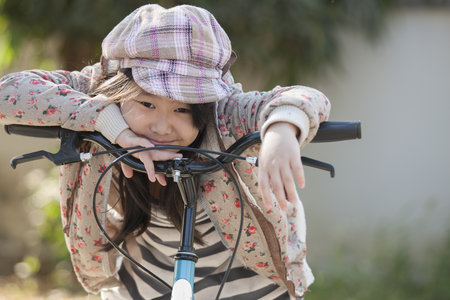 Girl and bikeの写真素材