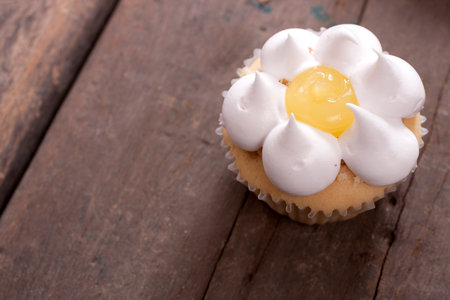 Vanilla cupcakes decorated with whipped creamの写真素材