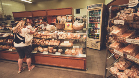 Women buying bread in bakery shop