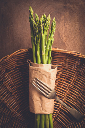 asparagus on a wooden background food styling mood and toned vintage style,selective focusの写真素材