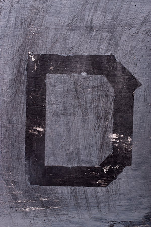 Black grunge alphabet sticky tape effect.Letter Dの写真素材