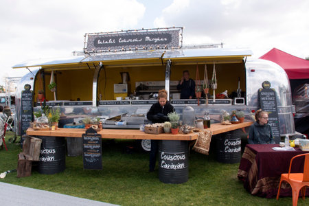 Amsterdam, Netherlands-May 14, 2016: Air stream caravan food truck selling cous cous