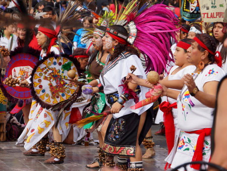 MEXICO CITY, MEXICO  December 12, 2015: Unknown Aztec dancers performing at the Our Lady of Guadalupe shrine celebrating Mexicos patron saints festivalのeditorial素材