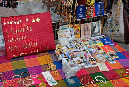 Ex-votos and religious souvenirs outside a church in Mexicoのeditorial素材
