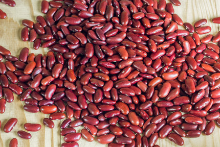 The top view, red beans and  on wooden table, Vegetarian food background and effect filter.の写真素材