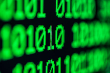 Technology background, close up on texture digital pixel is running prinary code number with black background and selective focus.の写真素材