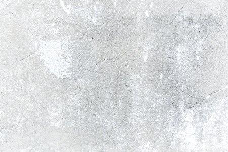 Abstract background on white texture, to show a rough of detail on cement surface.の写真素材