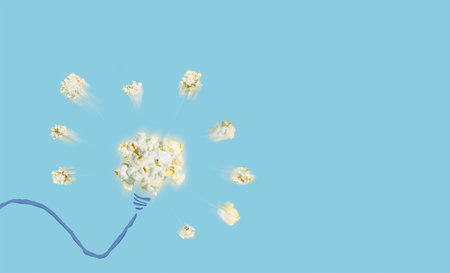 Thinking good idea pop up like a popcorn pop up with blue background, creative concept have a new...