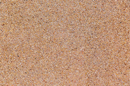 Abstract background on a small stone texture, to show a rough of detail on cement.の写真素材