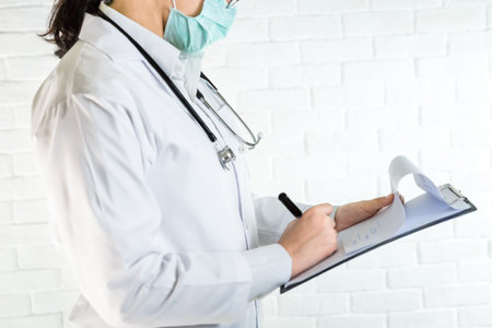 Medicine background, A doctor is checking list and analize the problem of patient, Health care concept.の写真素材