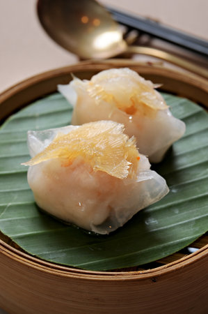 dim sum in bamboo steam containersの写真素材