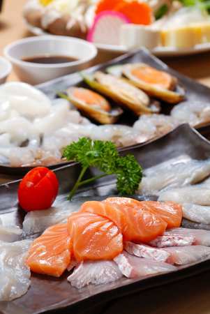 Fresh salmon slices and seafoodの写真素材