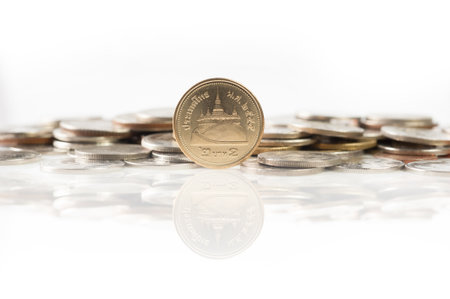 Thai baht coins, 2 baht coin with reflection isolated on white background の写真素材