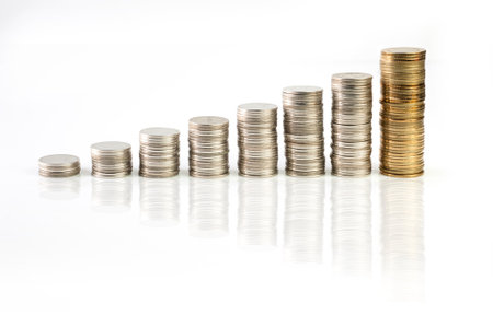 Rising Silver and gold Thai baht coins charts with reflection isolated on white background の写真素材