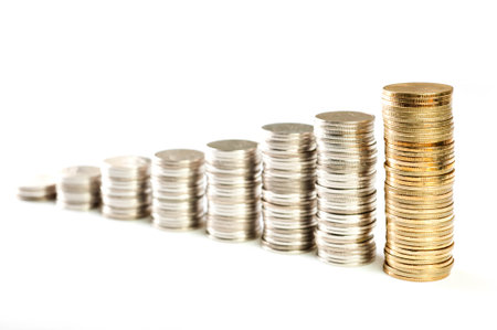 increasing Silver and gold Thai baht coins charts isolated on white background の写真素材