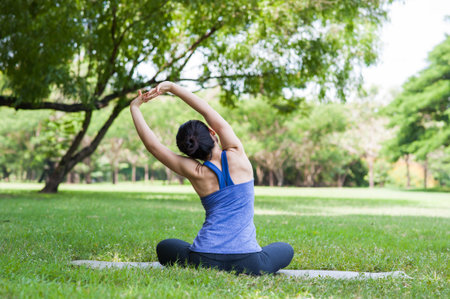 Relax pose in parkの写真素材