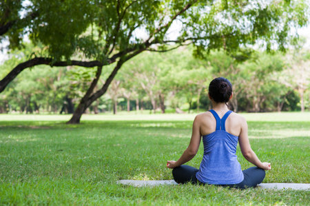 Relax pose in parkの写真素材