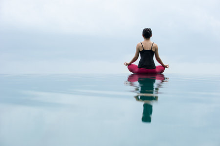 Padmasana Lotus position in yoga meditative positionの写真素材