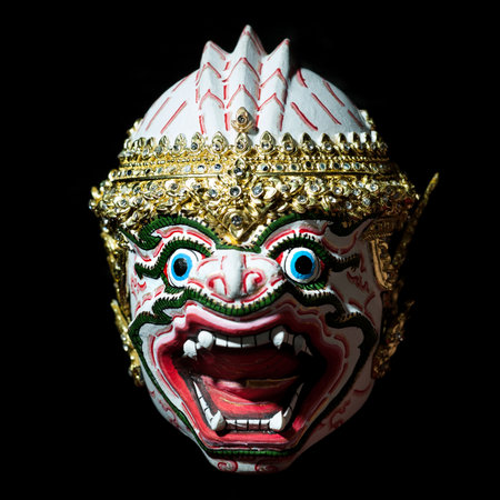 Head of Hanuman mask Khon Thai Classical Style (Ramayana Story) Thai handmade Paper Mache demon faced dance mask with gold and painted mirror workの写真素材