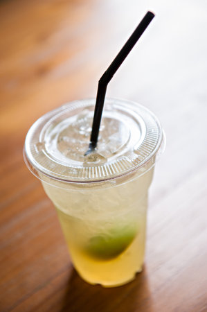 Iced lemonade soda in plastic cup