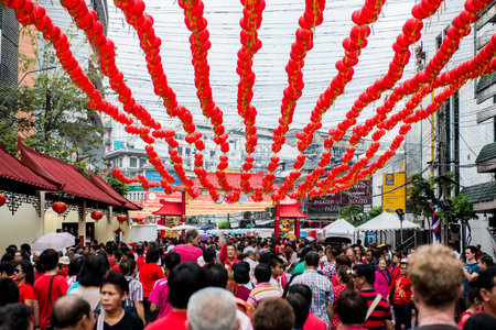 BANGKOK - FEBRUARY 19 : People walking  at Main street of Chinatown in Chinese New Year celebrations on February 19, 2015 at Yaowaraj road, Bangkok, Thailandのeditorial素材