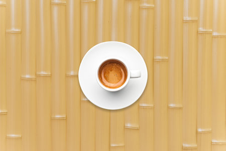 top view a cup of espresso coffee bamboo tableの写真素材