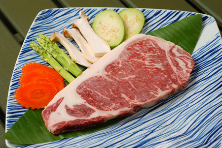 Premium raw japanese kobe beef sliced on plateの写真素材