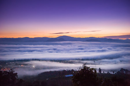 Sunrise and sea of clouds over Pai District Mae Hong Son, THAILAND. View from Yun Lai Viewpoint is located about 5 km to the West of Pai town centre above the Chinese Village.の写真素材